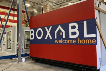 Equity Investments - Modular BOXABL home unit inside a warehouse.